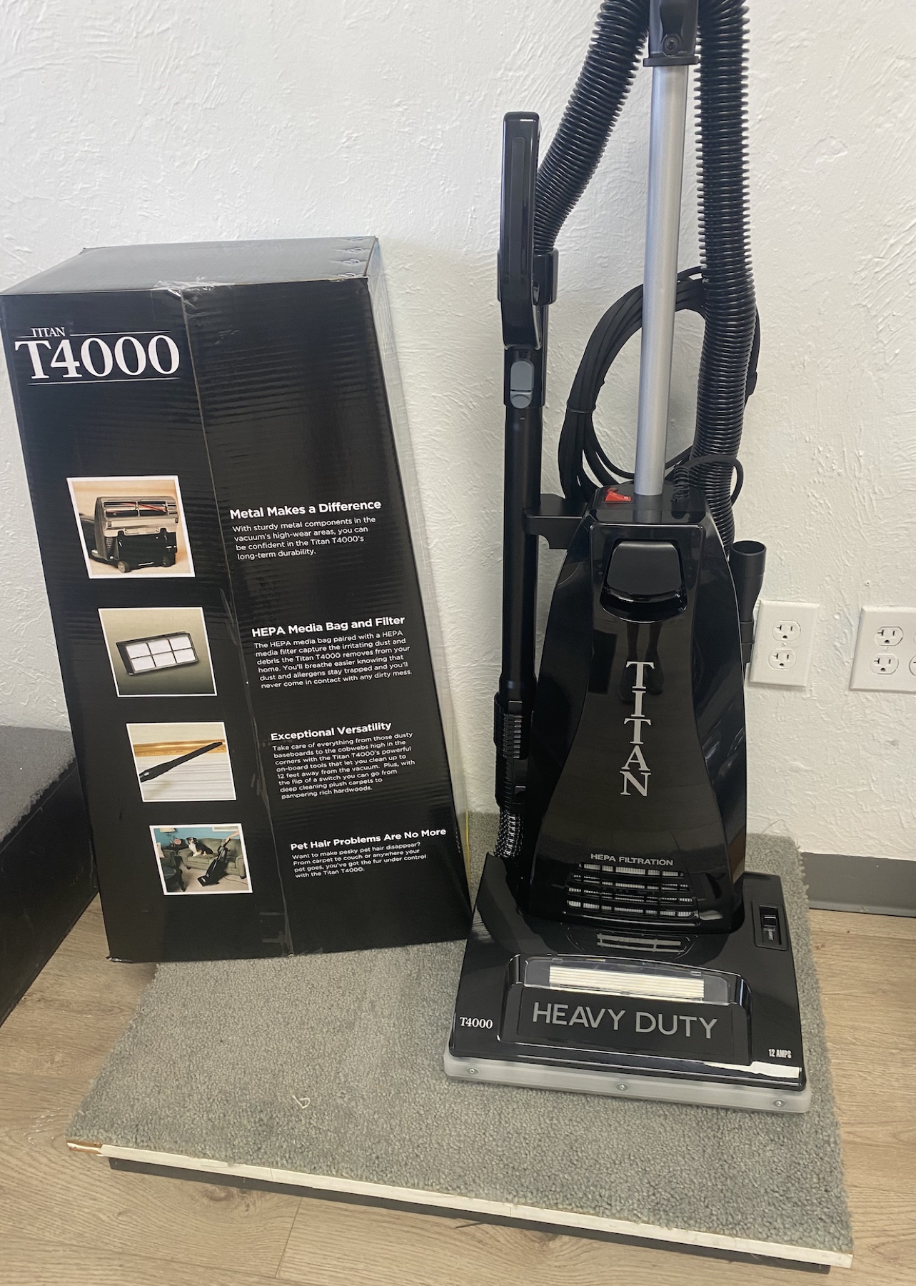 Titan T4000 upright vacuum and product box in the Skaggs Vacuums showroom